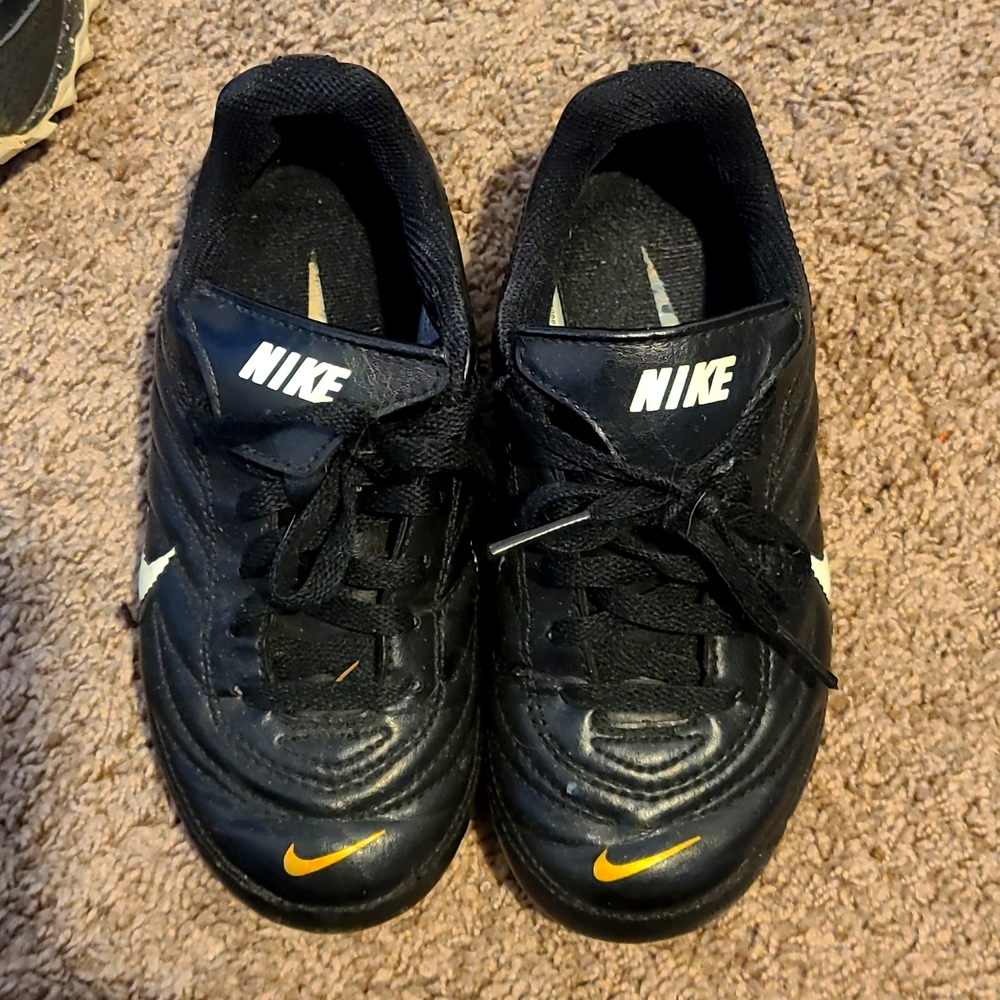Nike size 11 soccer cleats black & gold